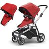 Thule Sleek Four-Wheel Stroller in Energy Red with Second Sibling Seat